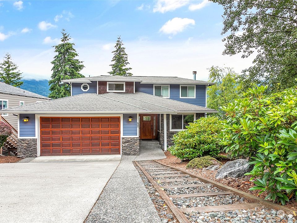 This charming home has wonderful street appeal. Cement siding and stone accent.>