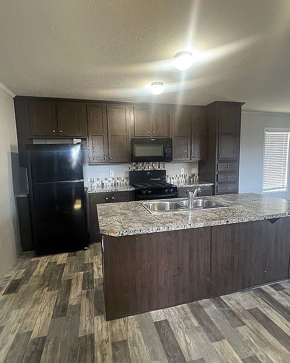 1st image of 534 E 37th Ave Lot 327