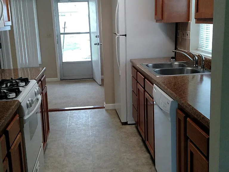 KITCHEN VIEW TO DINING AREA/FAMILY ROOM