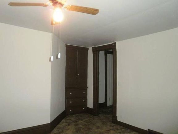 bedroom with door to living room