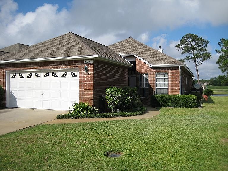 Executive homes all close together with smaller yards to maintain