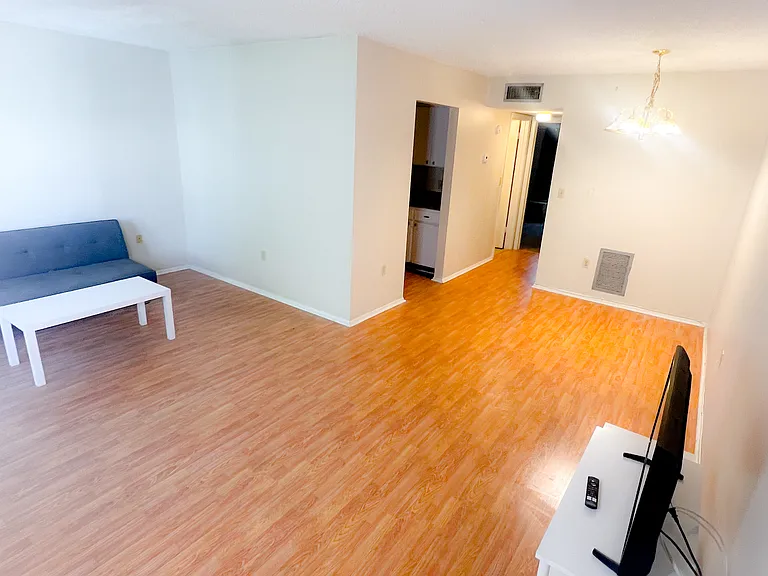 Unit is unfurnished and photos are staged. Furniture not included.