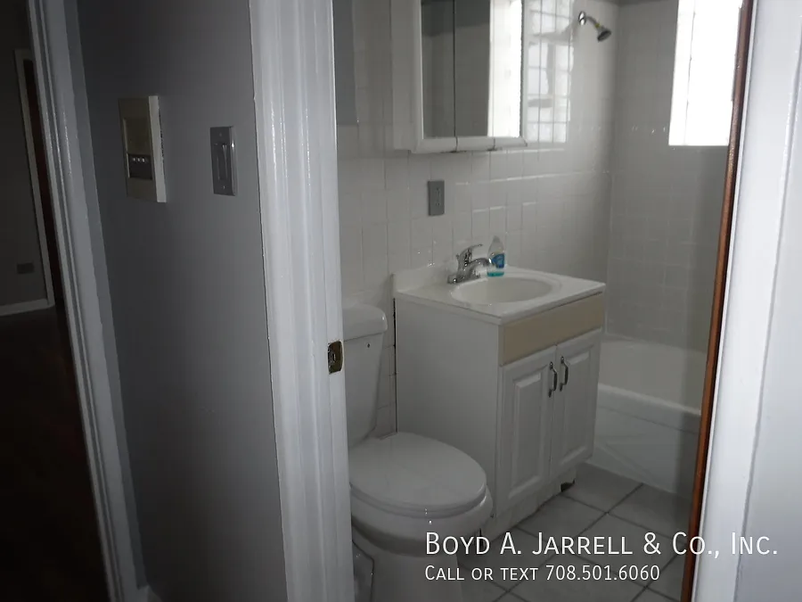 Building Photo - 8700 S Merrill Ave #2A-012-2A