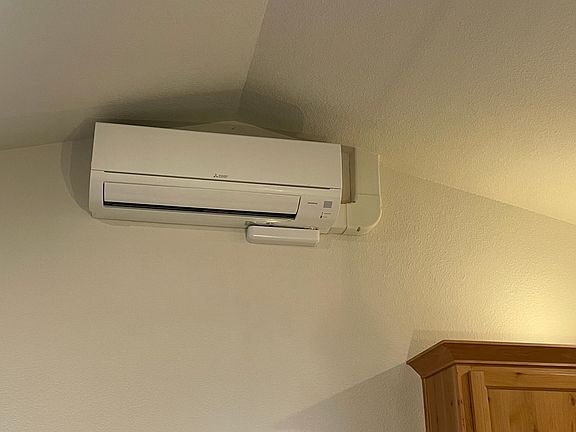 Each room has wall mounted, individually controlled, heating and cooling unit from heat pump.