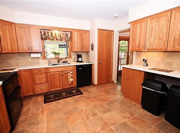 This kitchen has been updated with everything you need and want.  Lots of counter space.  Located adjacent to the dining room and slider to the deck for easy outdoor entertaining.