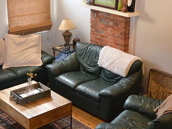 Living Room with Exposed Brick