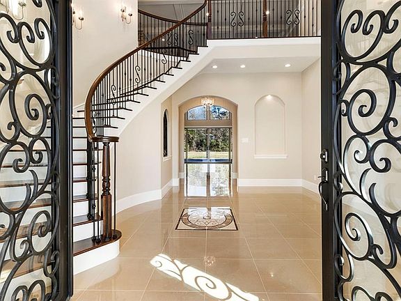 Sky High Entry with double iron doors.