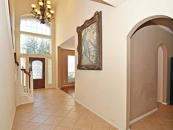 The beautiful tile floors are neutral to match any style or decor and are easy to maintain for however many years you intend to live here. Smart for resale! Love the arched entryways!