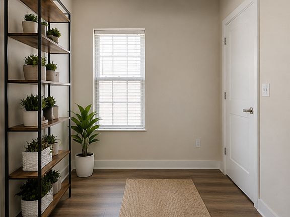 Bright entryway with high ceilings and clean contemporary finishes.