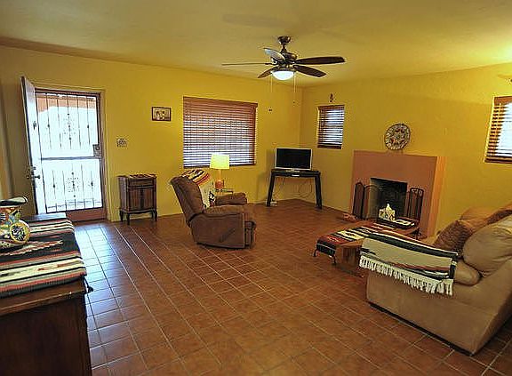 Tiled floors w/ ceiling fans