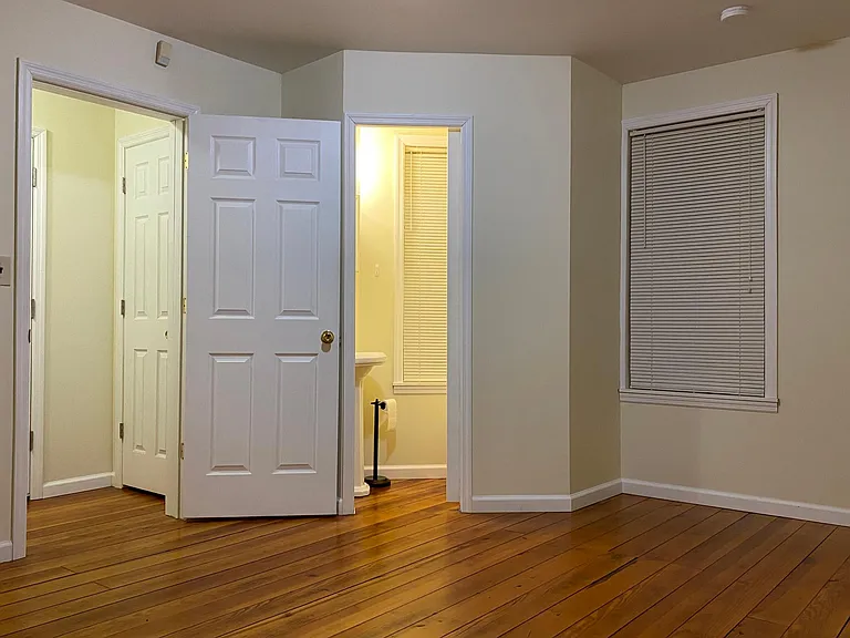 Master bedroom with half bath