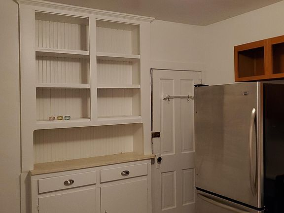 Charming built in china cabinet.