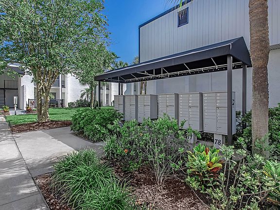 Experience convenience and greenery with our well-maintained mail area.