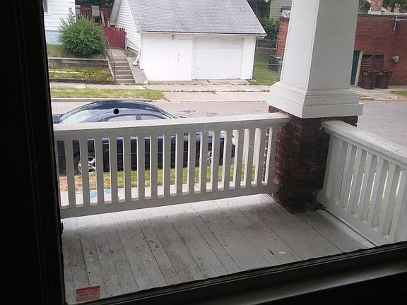 Interior looking at front covered porch, front