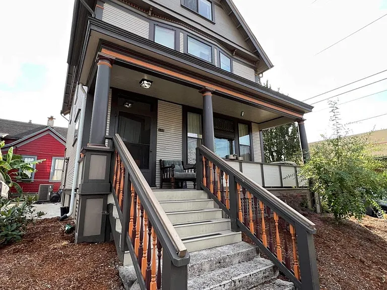 House shown with current landscaping