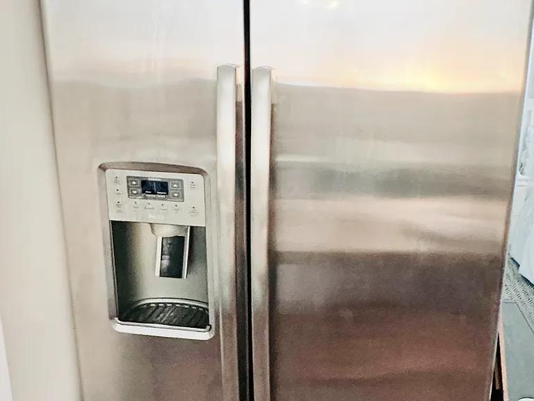 GE Refrigerator with Water/Ice Dispenser and Filters.