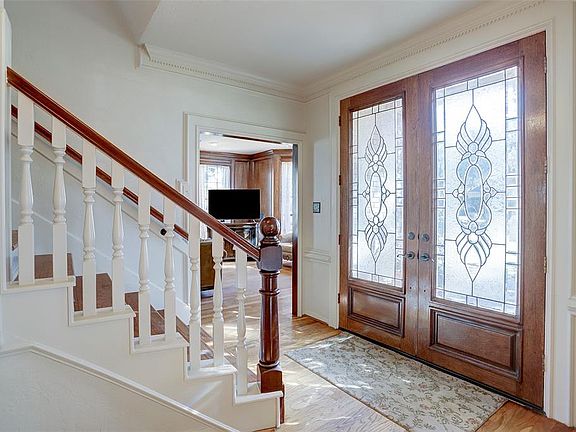 The double doors with beveled glass add to the beauty of this home.