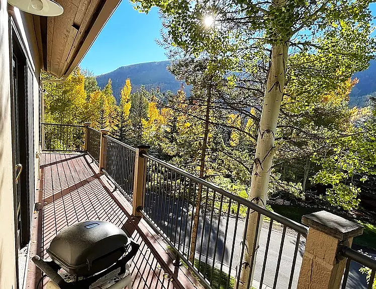 Full length wrap-around deck with tranquil, sweeping views from east to west