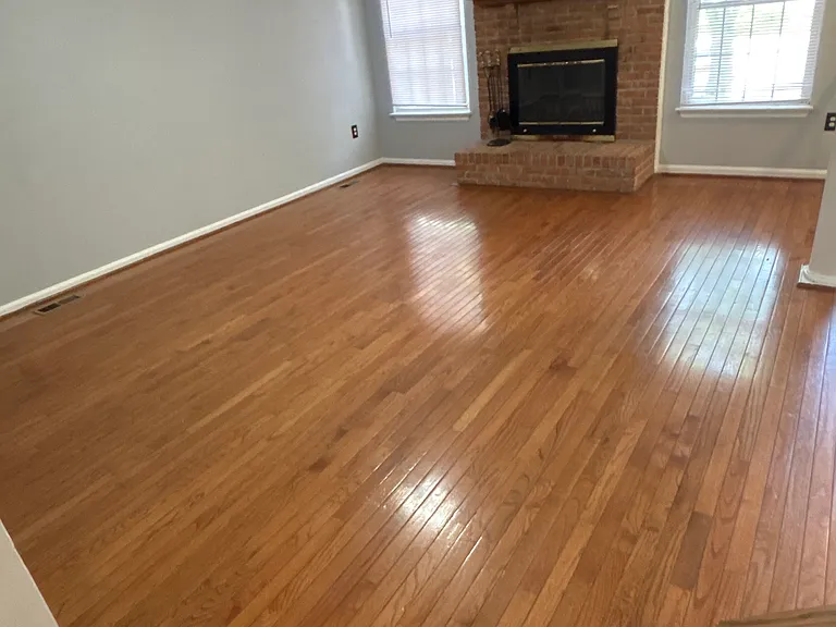 Living Room w/ Fireplace/Ceiling Fan