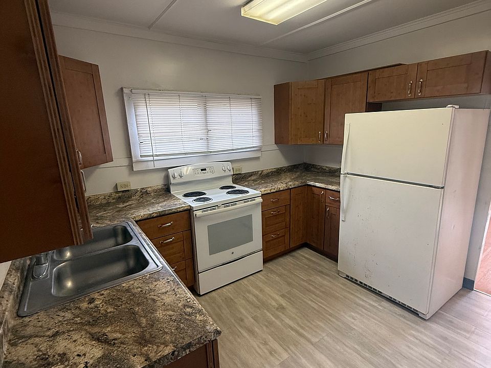 Kitchen is separated from living room.