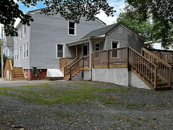 View from back of property, showing updated deck.