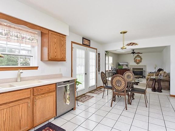 The spacious 20x10 eat-in kitchen flows effortlessly into the family room. The French doors provide easy access to the backyard.