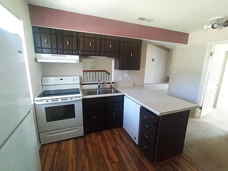 Kitchen with newer appliances.