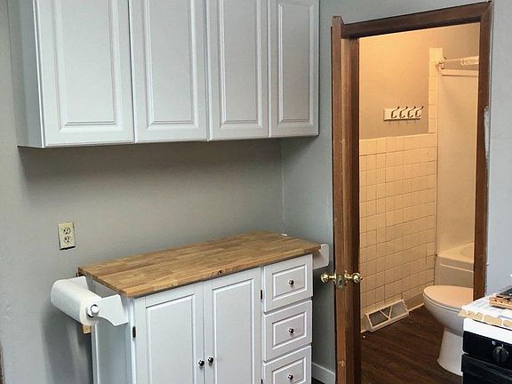 New rolling kitchen island with fold up leaf for use as a table