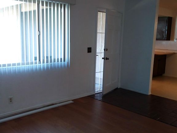 LR entry by dining area, kitchen