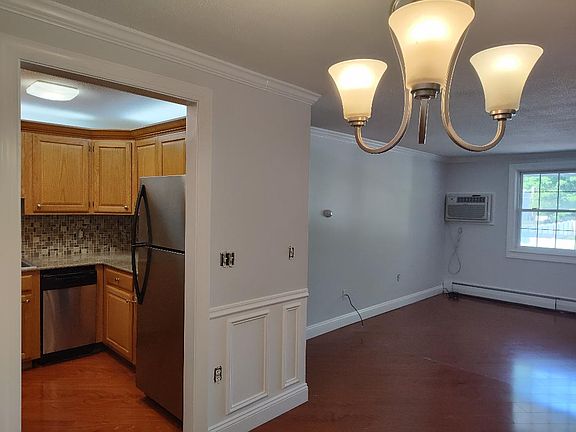 Kitchen - Open dining room and living room area