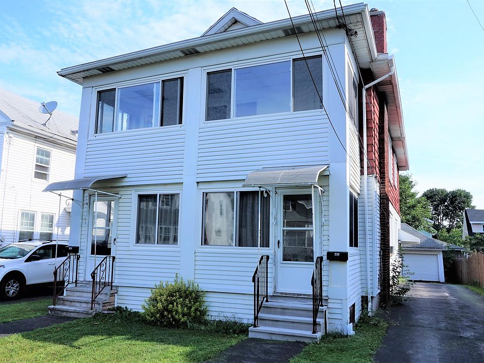 Welcome to 156 Kenwood Ave. This 2nd floor flat is tucked away on a peaceful stretch of the Northside of Syracuse. Enjoy the convenience of entrances found at both front (left side shown here) or at the rear.