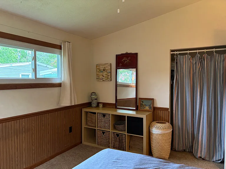 master bedroom with cube storage and closet