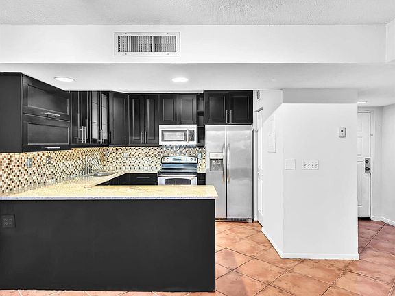 2nd image of 13250 SW 88th Ter #3XX