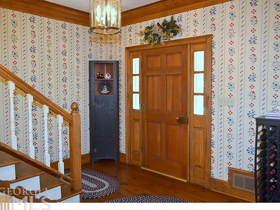 Foyer entry with heart of pine floors