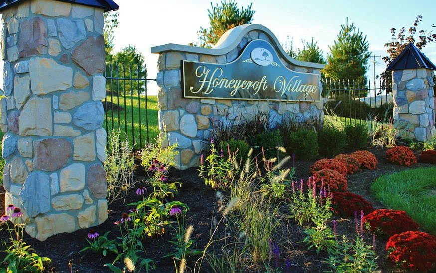 Entrance Signs at Honeycroft Village 55 Community