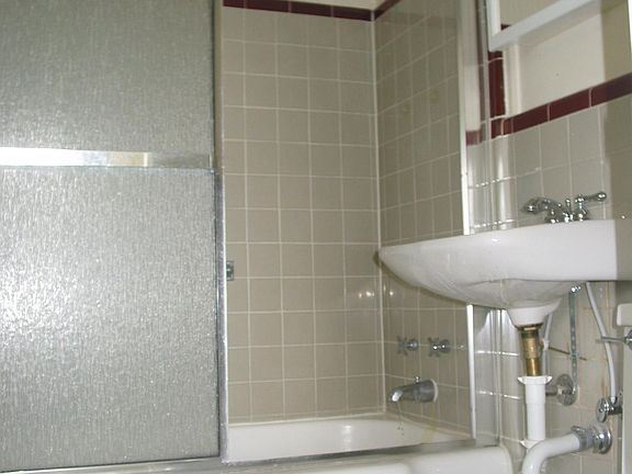 Unit 517 has 2 full bathrooms with original tile. 