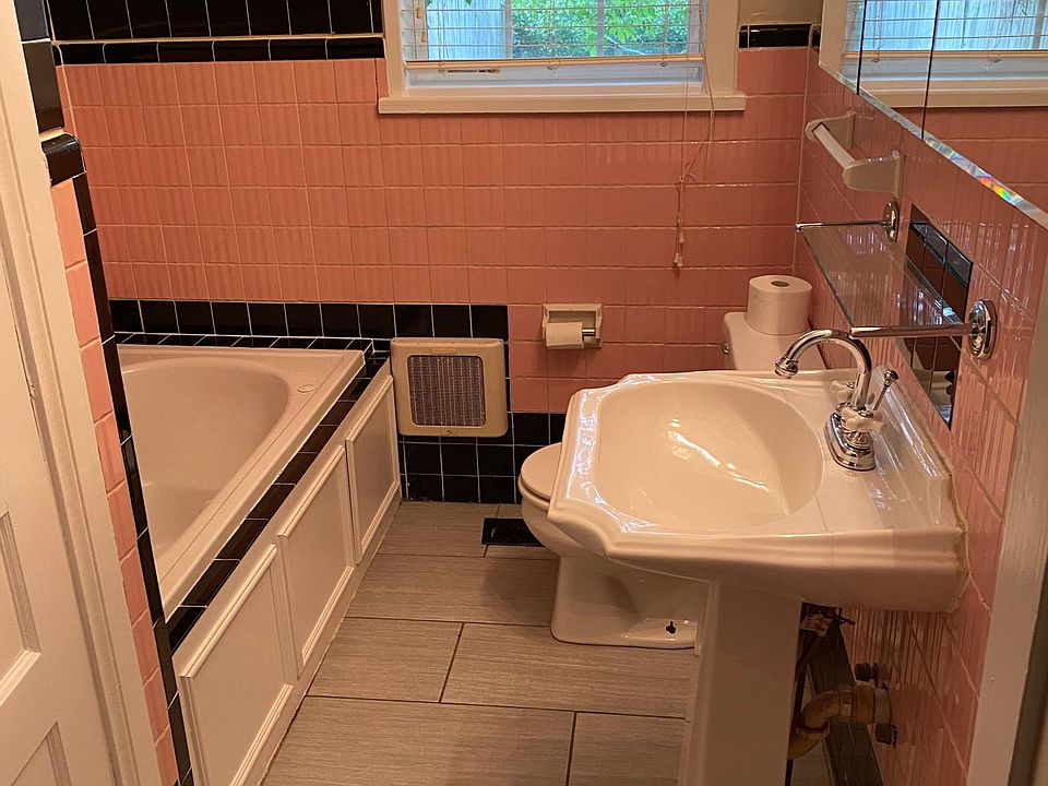 Bathroom with deep jacuzzi tub