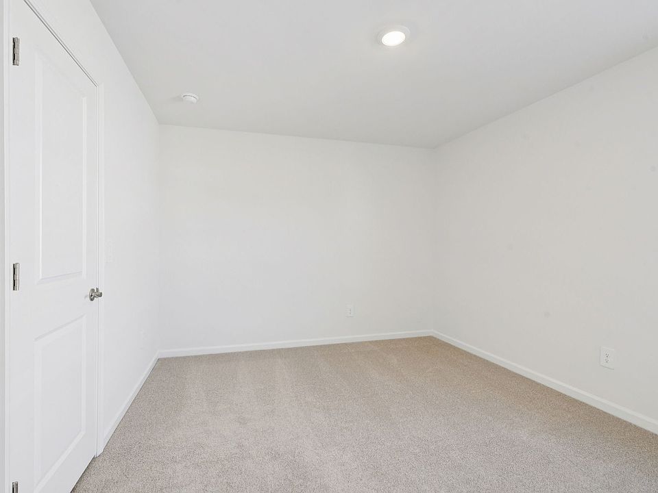 Secondary bedroom in the Sherwood floorplan at a Meritage Homes community in Raleigh, NC.