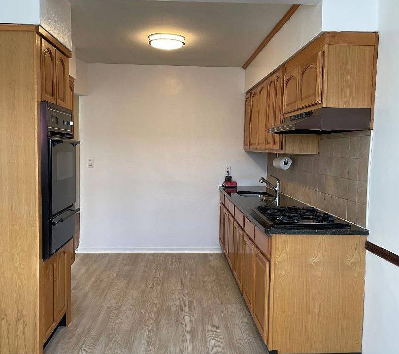 1st image of 5921 72nd St Floor 2