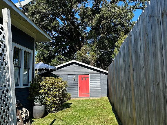 Side Yard/Back Entrance 
*Shed not available to tenant