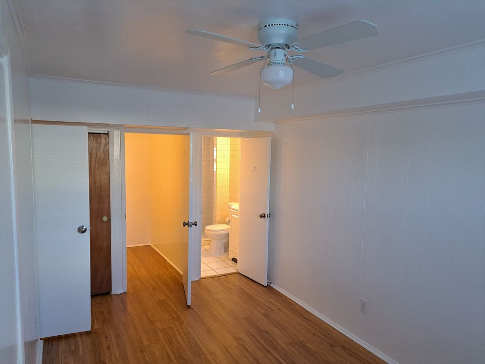 Bedroom area toward bath and storage