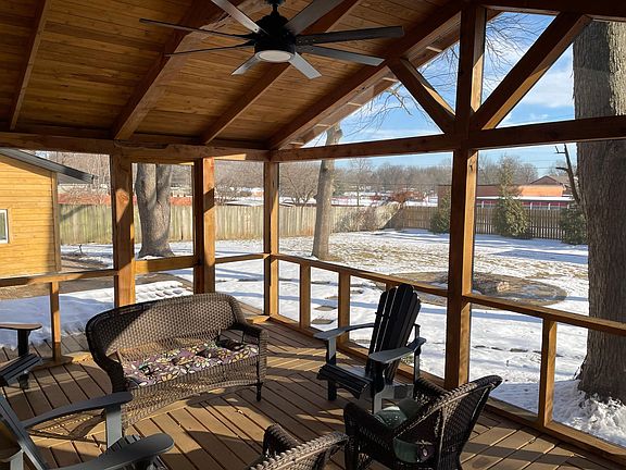 Screened in porch and outdoor fire pit