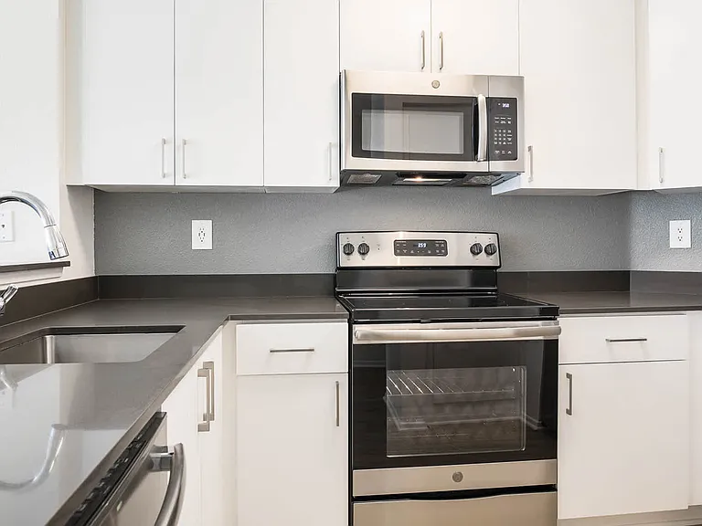 Kitchen with Stainless Steel Appliances and Granite Countertops
