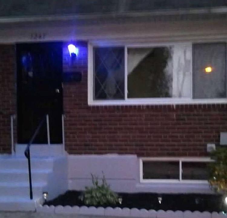 Front of home at night (freshly landscaped)