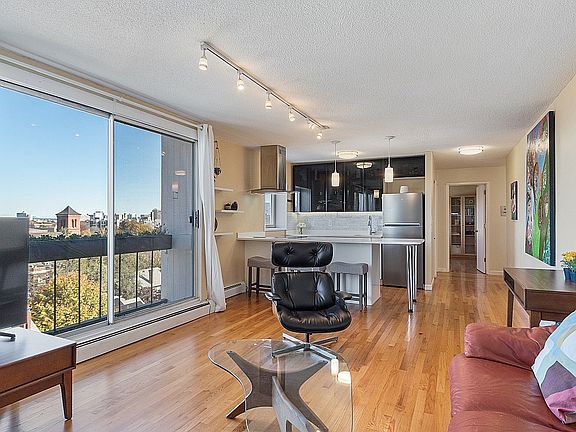 Open Floor Plan: Living Room, Balcony, Kitchen, Dinning Area