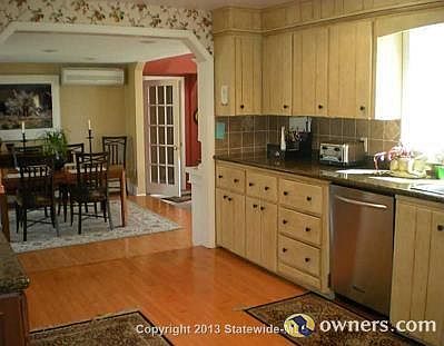 Open Kitchen w/Granite and SS Appliances