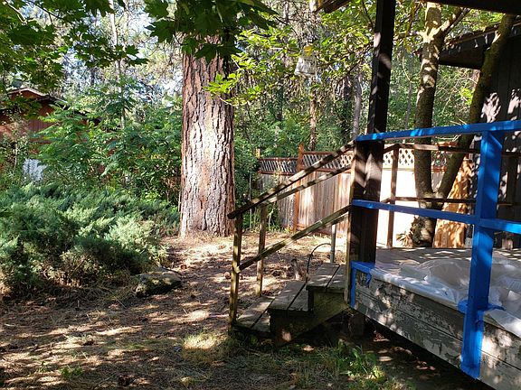 Deck rails receiving a colorful coat of paint...summer 2019.