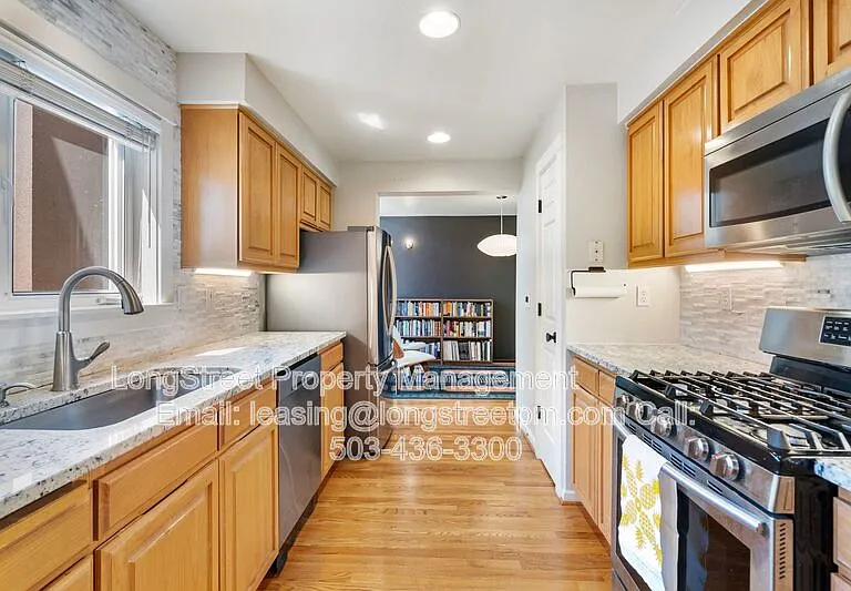 10247 NW Village Heights Dr — Photo 20