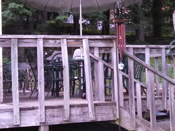 Deck off side of house