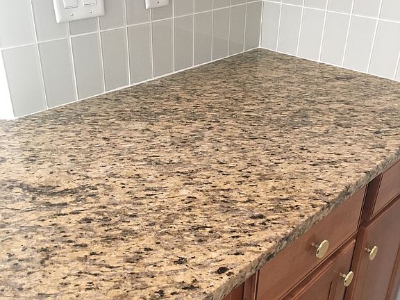 new granite and backsplash